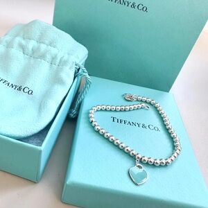 Tiffany & Co. Silver Bracelet with Blue Heart Charm